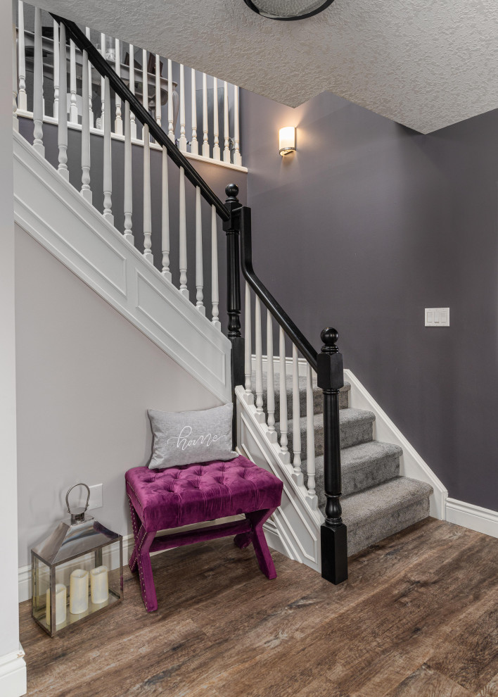 Example of a transitional home design design in Toronto