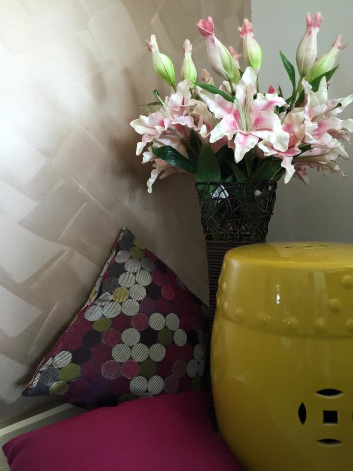 This is an example of a contemporary living room in Melbourne with beige walls and ceramic floors.