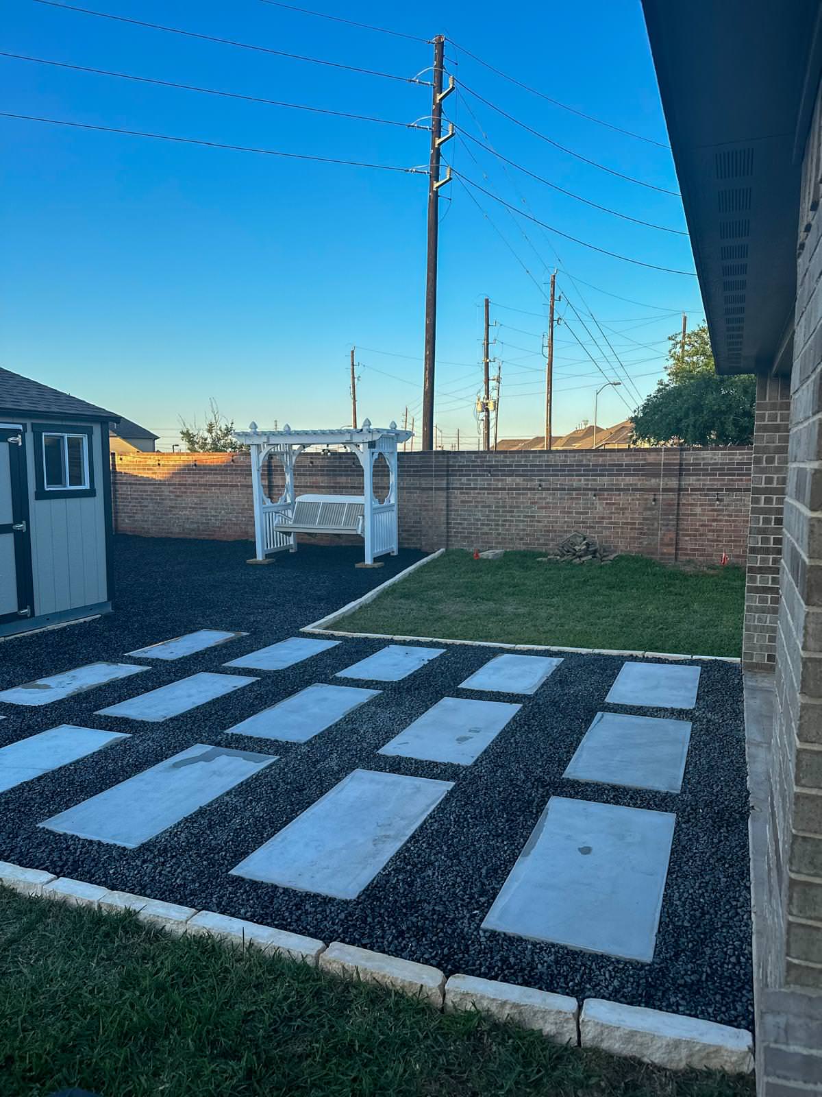 Backyard paver patio with gravel!