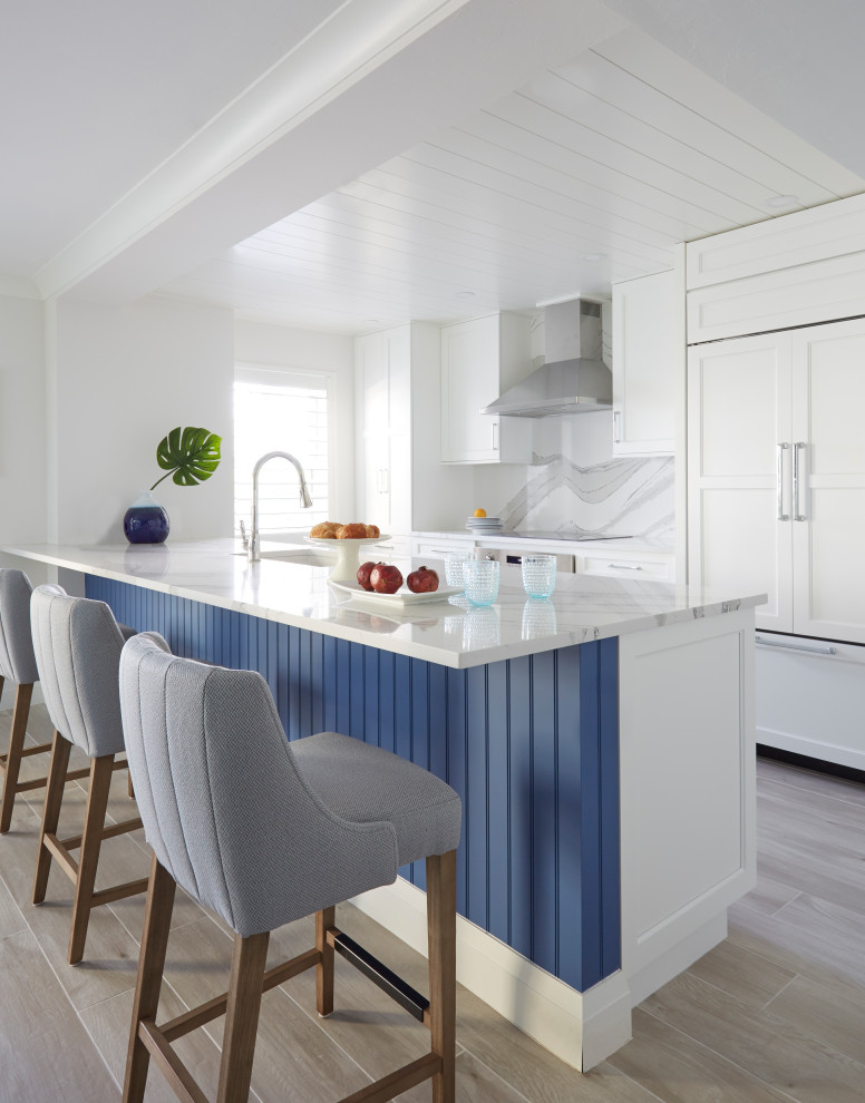 Mid-sized beach style galley open plan kitchen.