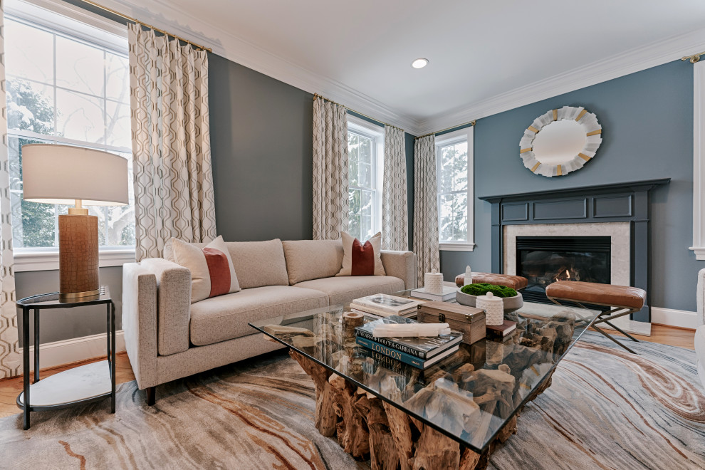 Transitional formal and enclosed medium tone wood floor, brown floor and tray ceiling living room photo in Philadelphia with blue walls, no fireplace and no tv