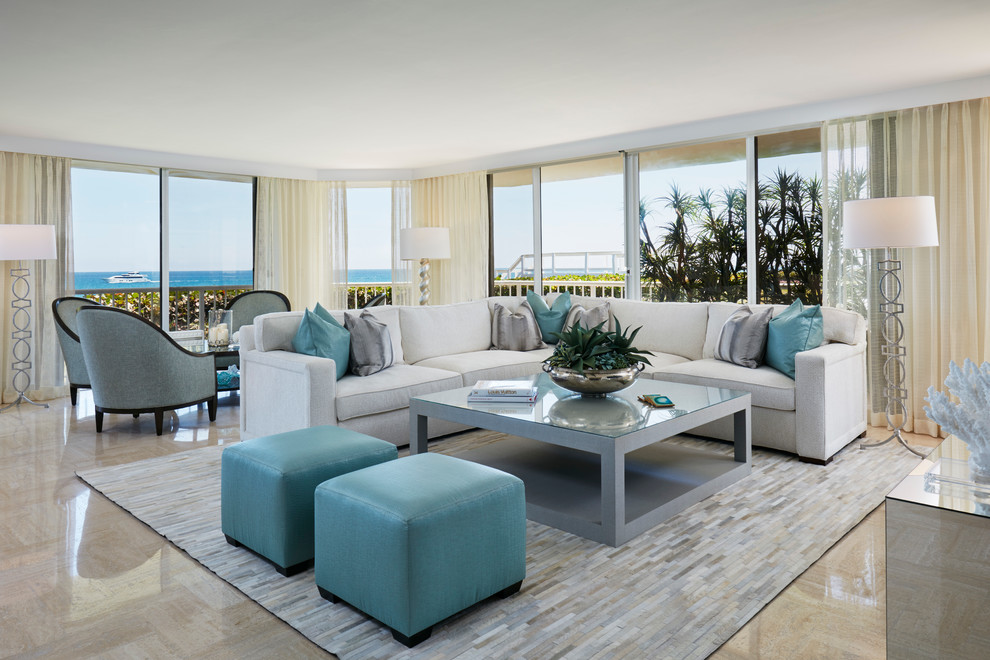 This is an example of a transitional open concept living room in Miami.