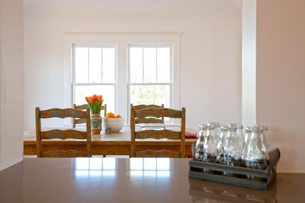 Arts and crafts medium tone wood floor dining room photo in Phoenix with white walls