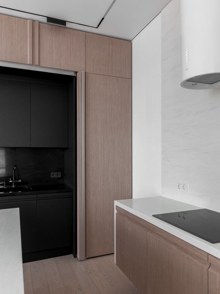 Подвесная тумба с белой столешницей и вытяжка в едином светлом исполнении