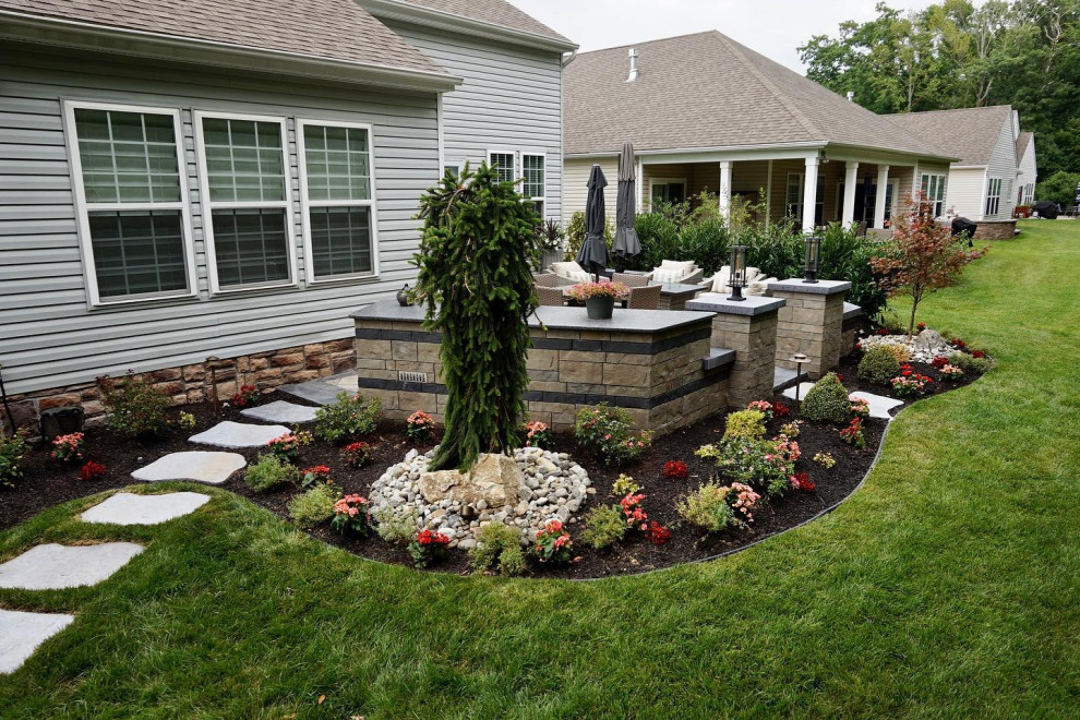 Farmingdale, NJ: Outdoor Living w/ Organic Landscape Shapes, BBQ & Paver Pathway