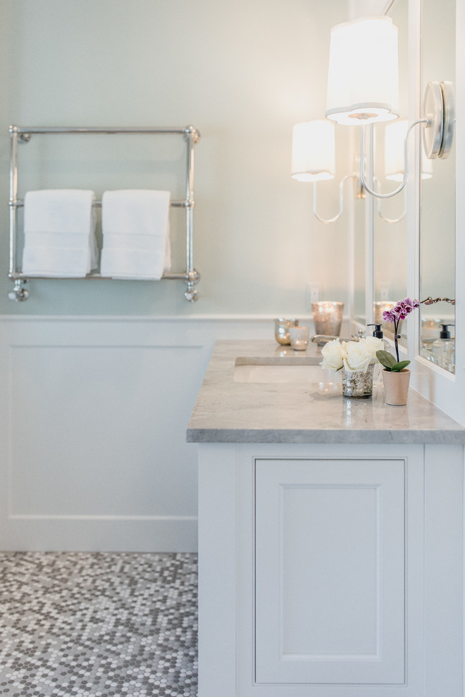 Mid-sized transitional master bathroom in Detroit with furniture-like cabinets, white cabinets, a freestanding tub, an alcove shower, a two-piece toilet, white tile, subway tile, green walls, mosaic tile floors, an undermount sink, quartzite benchtops, multi-coloured floor, a hinged shower door and grey benchtops.
