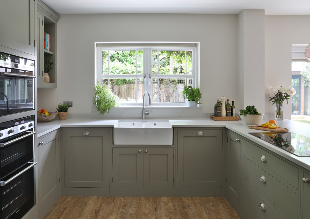 This is an example of a traditional kitchen in Surrey.