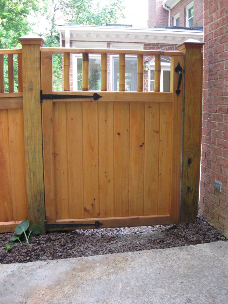 Patio - mid-sized contemporary side yard brick patio idea