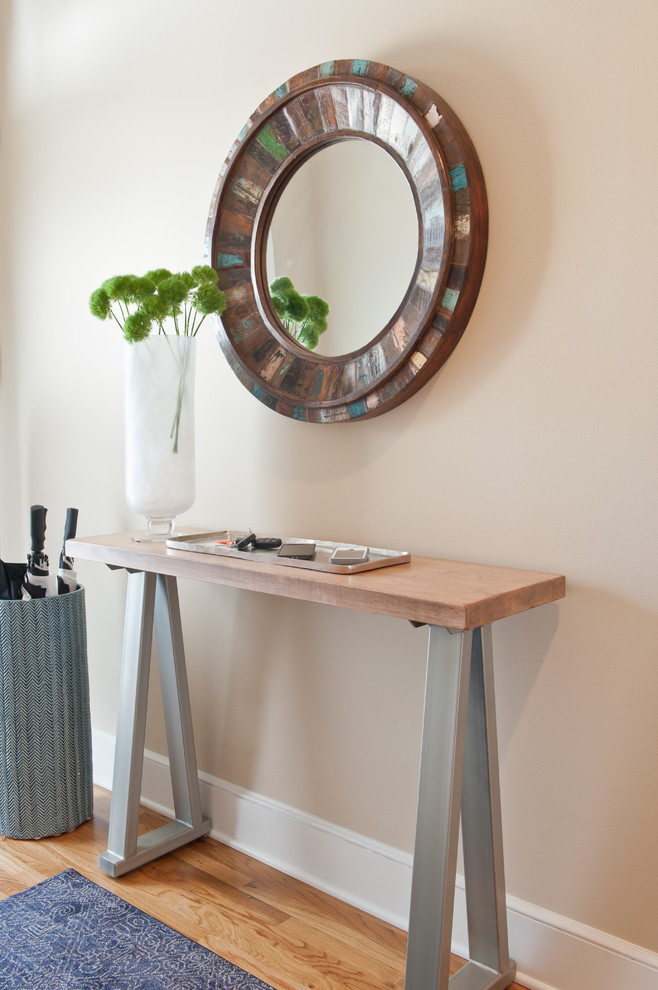 Transitional medium tone wood floor and brown floor entryway photo