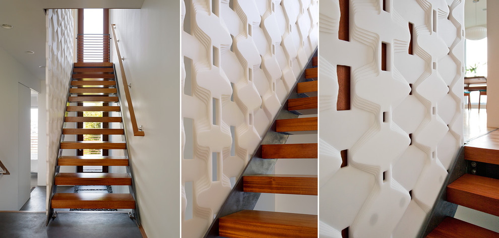Mid-sized modern wood floating staircase in San Francisco with open risers.