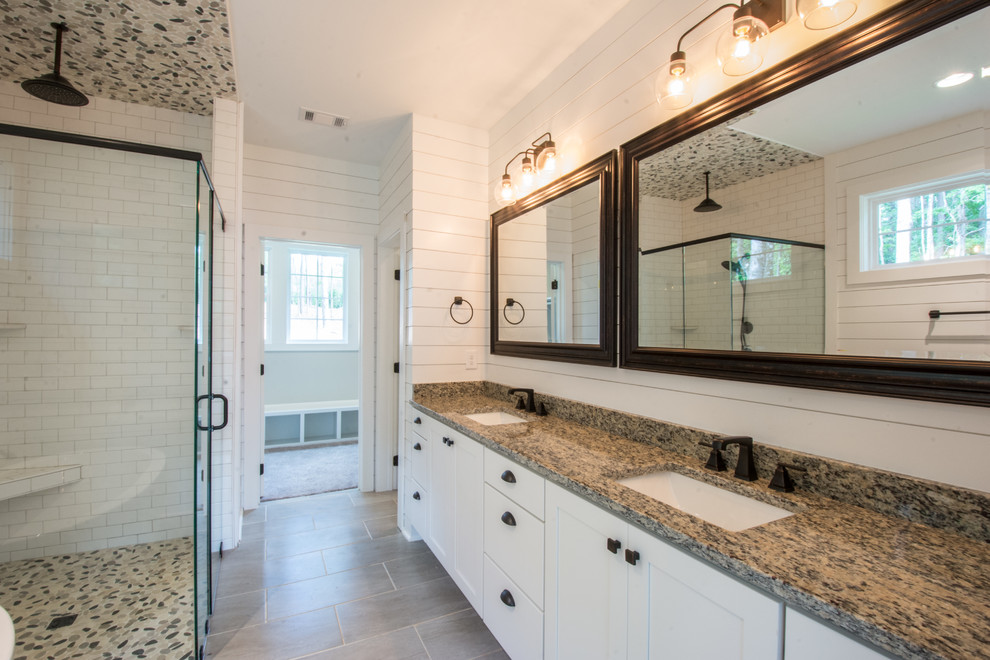 Design ideas for a large country master bathroom in Atlanta with shaker cabinets, white cabinets, an open shower, white walls, porcelain floors, an undermount sink, granite benchtops, grey floor, a hinged shower door and multi-coloured benchtops.