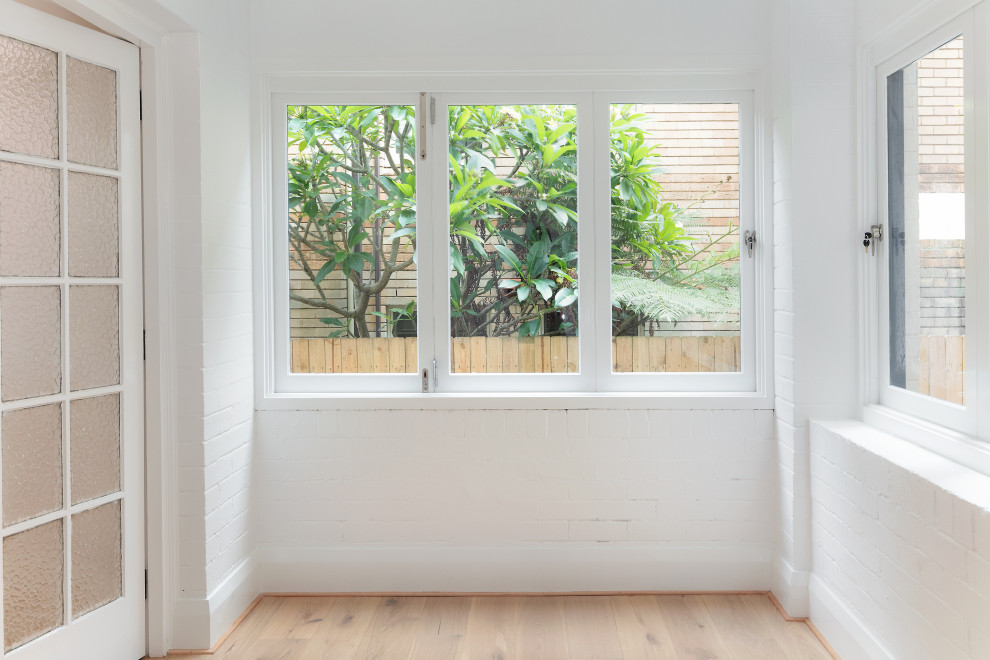 Design ideas for a beach style dining room in Sydney.