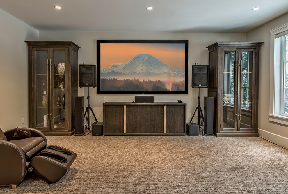 Inspiration for a mid-sized traditional enclosed home theatre in Vancouver with beige walls, carpet, a projector screen and beige floor.