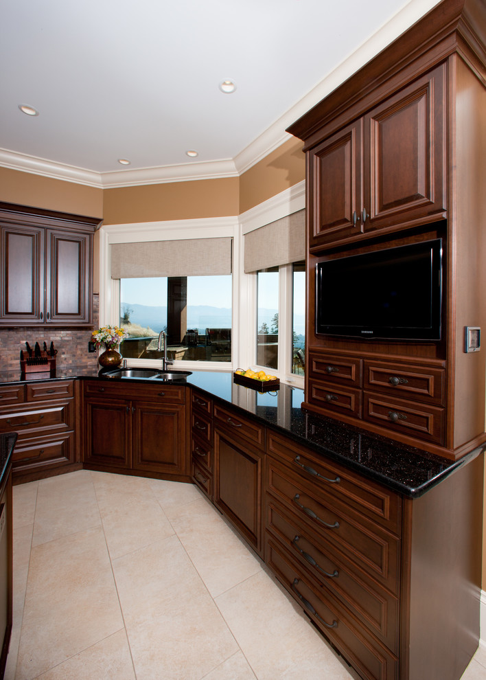 Huge mountain style u-shaped porcelain tile and beige floor open concept kitchen photo with an undermount sink, raised-panel cabinets, dark wood cabinets, granite countertops, red backsplash, porcelain backsplash, stainless steel appliances and a peninsula