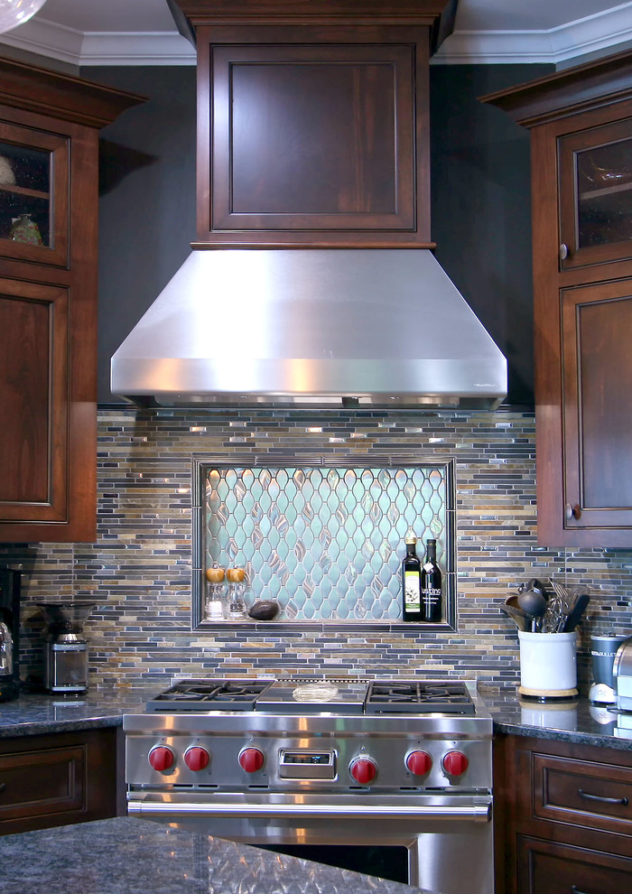 Eat-in kitchen - large transitional medium tone wood floor eat-in kitchen idea in Charlotte with an undermount sink, flat-panel cabinets, stainless steel appliances and an island