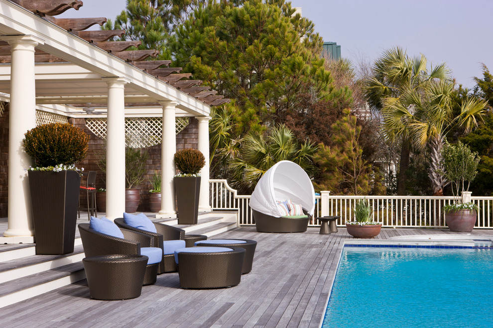 Design ideas for a traditional pool in Charleston with decking.