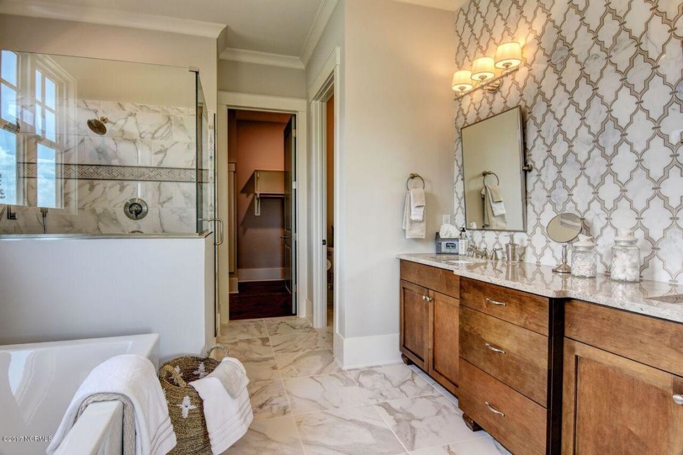 Large transitional master bathroom in Other with shaker cabinets, medium wood cabinets, a freestanding tub, an open shower, a two-piece toilet, yellow tile, marble, grey walls, marble floors, an undermount sink, granite benchtops, white floor and a hinged shower door.