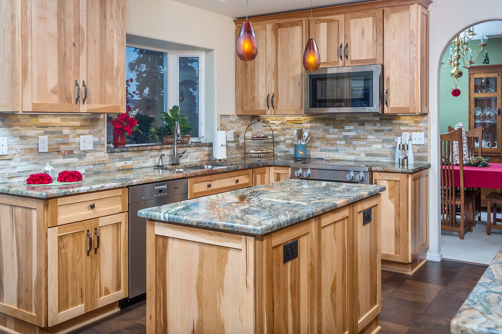 Kitchen - mid-sized rustic vinyl floor kitchen idea with an undermount sink, recessed-panel cabinets, light wood cabinets, granite countertops, stainless steel appliances and an island