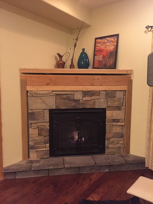 Weird half corner fireplace + where to buy fireplace stone/tile We have a weird half fireplace insert in the corner of our open concept house. We just removed the ornate mantel piece that was an add-on. Now I