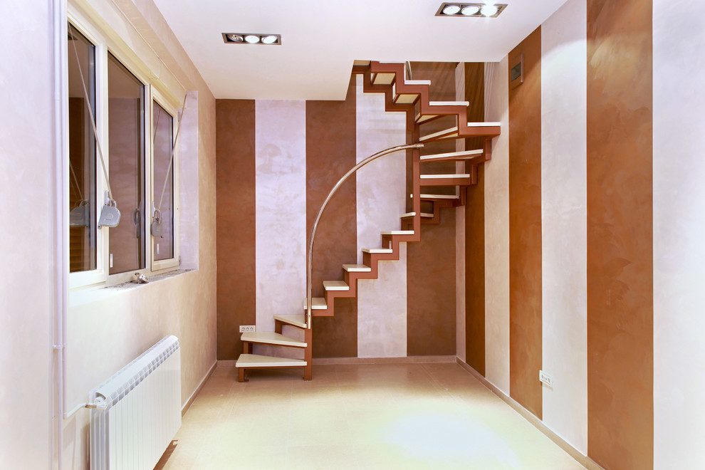 Inspiration for a mid-sized modern spiral staircase in New York with open risers.