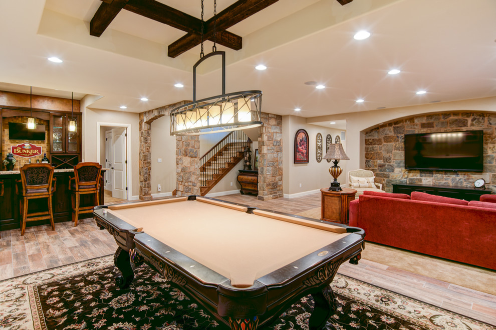 Elegant beige floor basement photo in Denver with beige walls