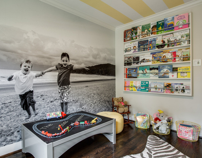Small eclectic gender-neutral dark wood floor playroom photo in Dallas with beige walls