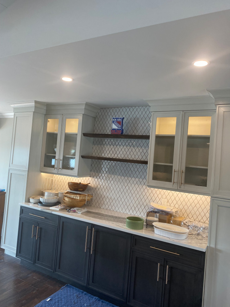 GE Cafe matte white appliances and Cambria Skara Brae island