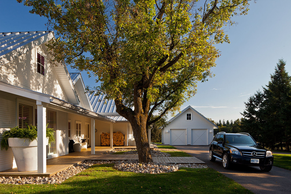 Photo of a country exterior in Toronto with wood siding.