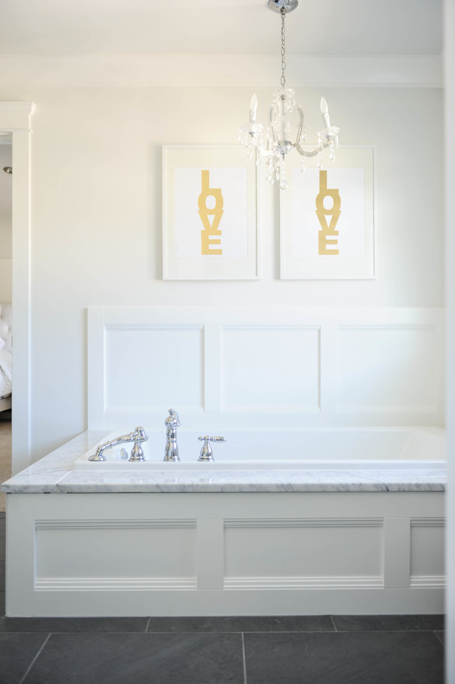 Design ideas for a traditional master bathroom in Vancouver with shaker cabinets, white cabinets, marble benchtops, a drop-in tub, gray tile, ceramic tile and white walls.