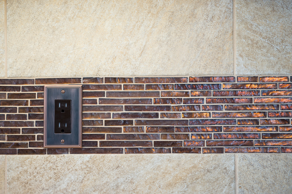 Large transitional l-shaped dark wood floor and brown floor open concept kitchen photo with metallic backsplash, mosaic tile backsplash, raised-panel cabinets, dark wood cabinets, an island, an undermount sink, quartz countertops and stainless steel appliances
