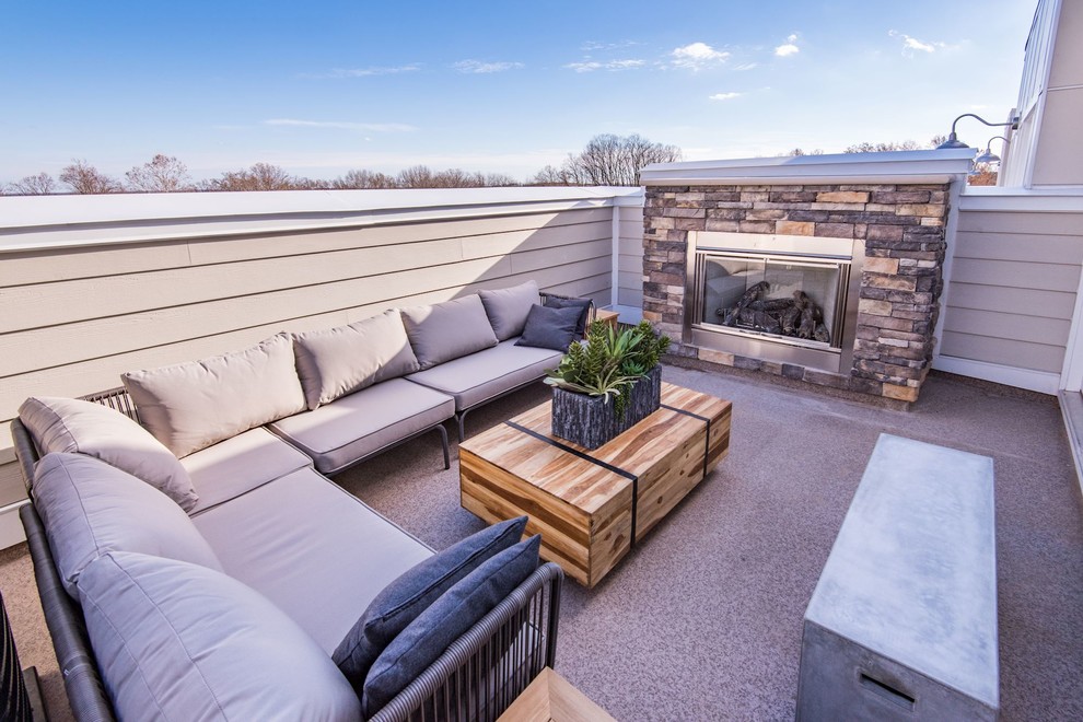 Photo of a small side yard patio in DC Metro with a fire feature, decomposed granite and no cover.