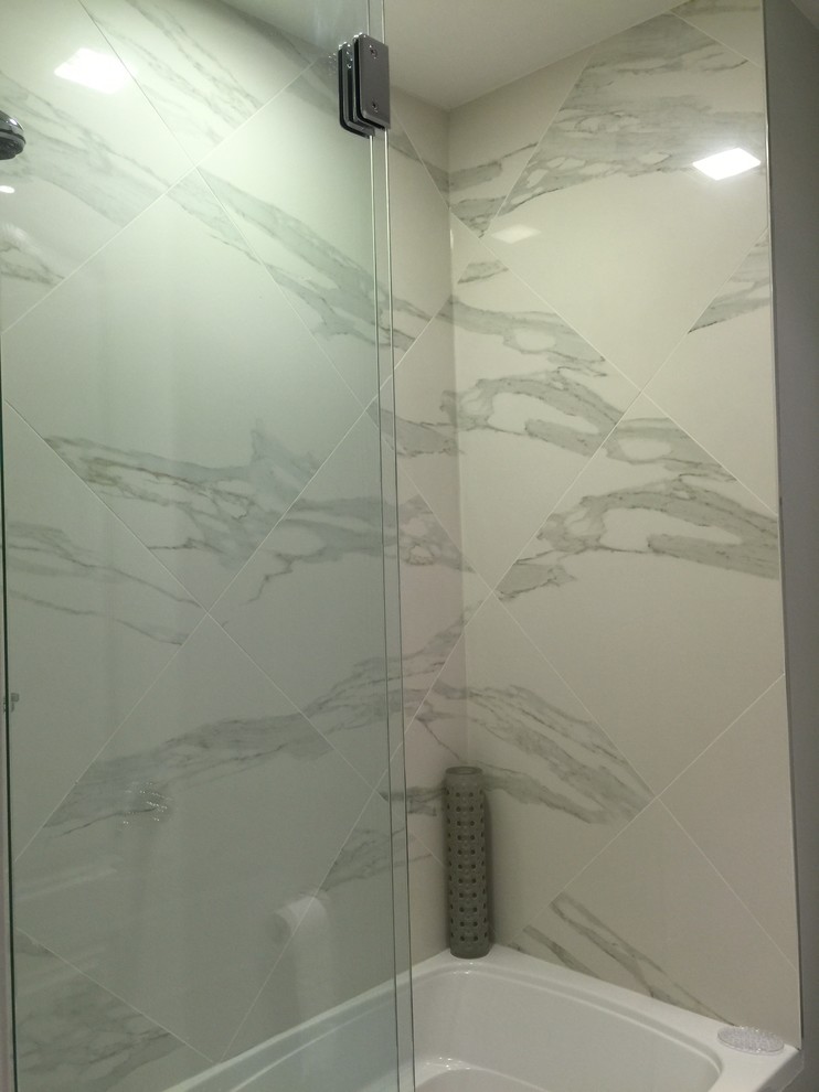 Example of a transitional home design design in Toronto