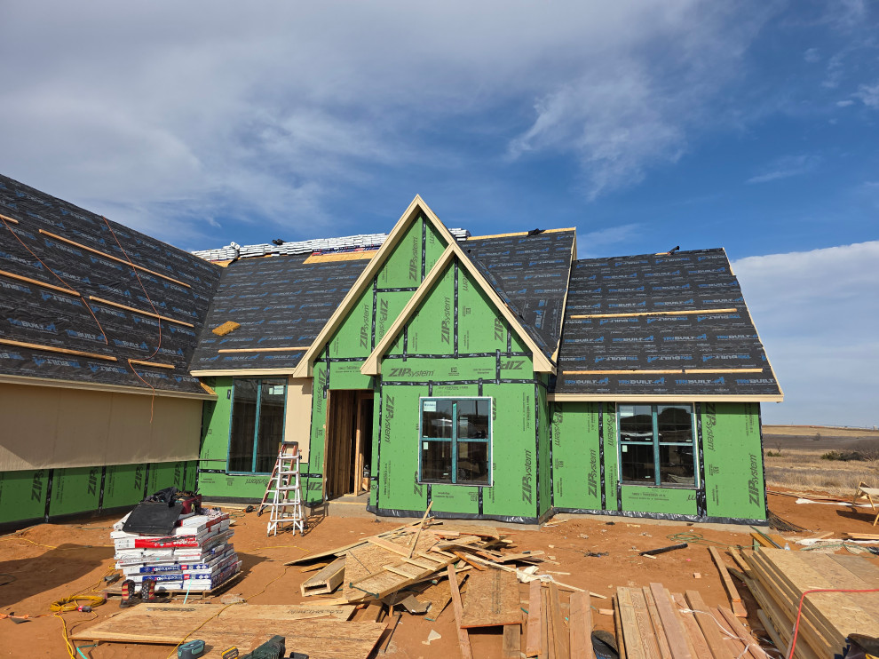 Sided and first layer of roof on the front