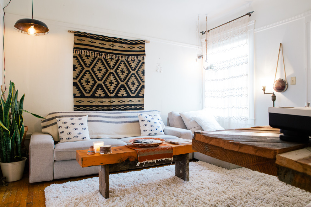 Photo of an eclectic living room in San Francisco with white walls.