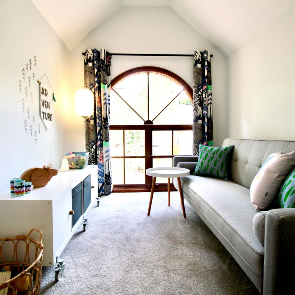 Small scandinavian gender-neutral kids' bedroom in Sydney with white walls, carpet, grey floor and vaulted for toddlers.