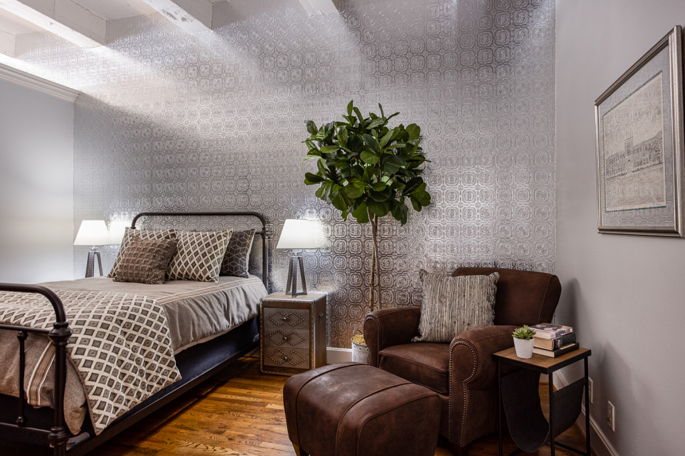 Example of an urban bedroom design in Houston