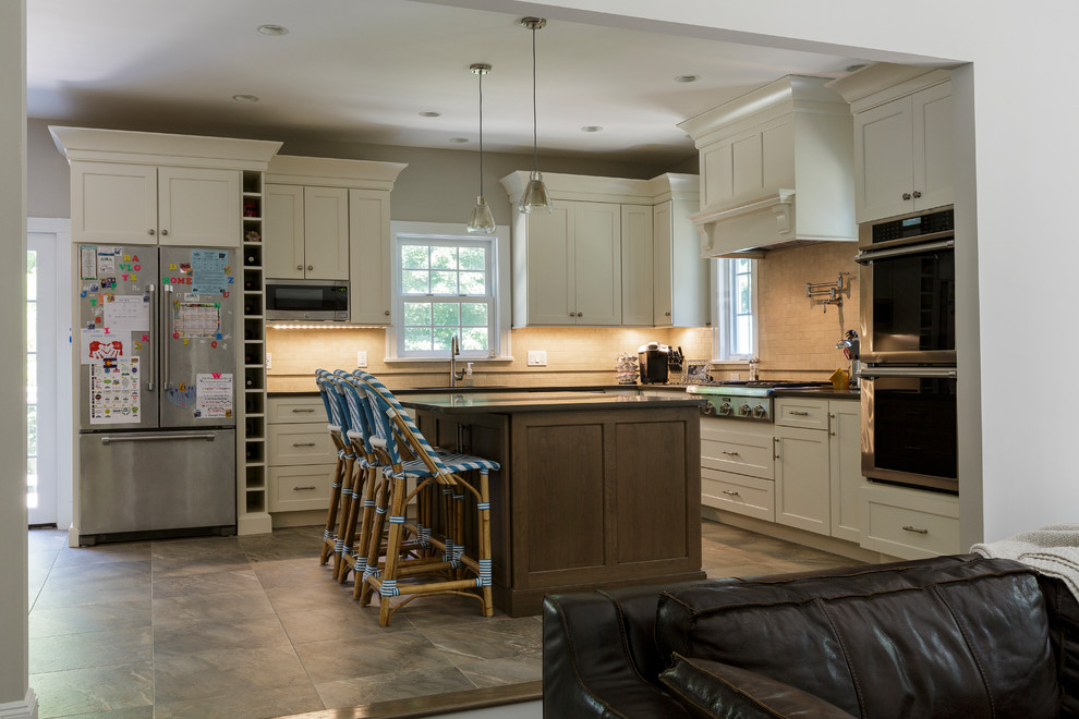 Open concept kitchen - mid-sized rustic l-shaped porcelain tile and beige floor open concept kitchen idea in Bridgeport with an undermount sink, shaker cabinets, white cabinets, granite countertops, beige backsplash, porcelain backsplash, stainless steel appliances and an island
