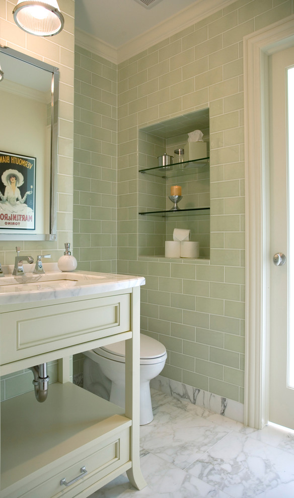 This is an example of a contemporary bathroom in Chicago with subway tile, a console sink, green tile, marble floors and grey floor.