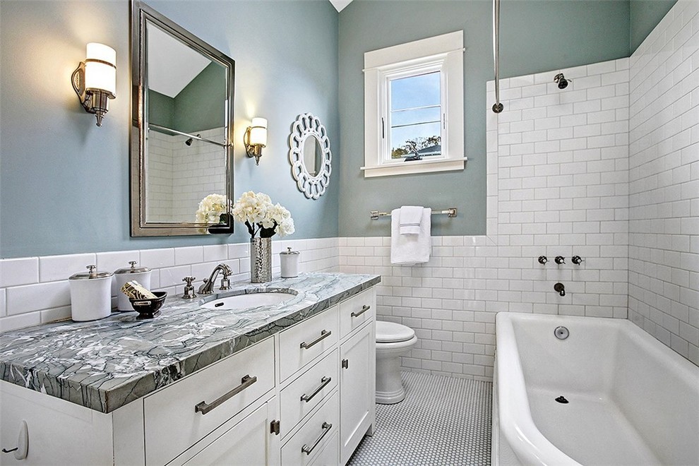 This is an example of a small transitional 3/4 bathroom in Seattle with shaker cabinets, white cabinets, a freestanding tub, a shower/bathtub combo, white tile, subway tile, grey walls, an undermount sink, white floor, a shower curtain and grey benchtops.
