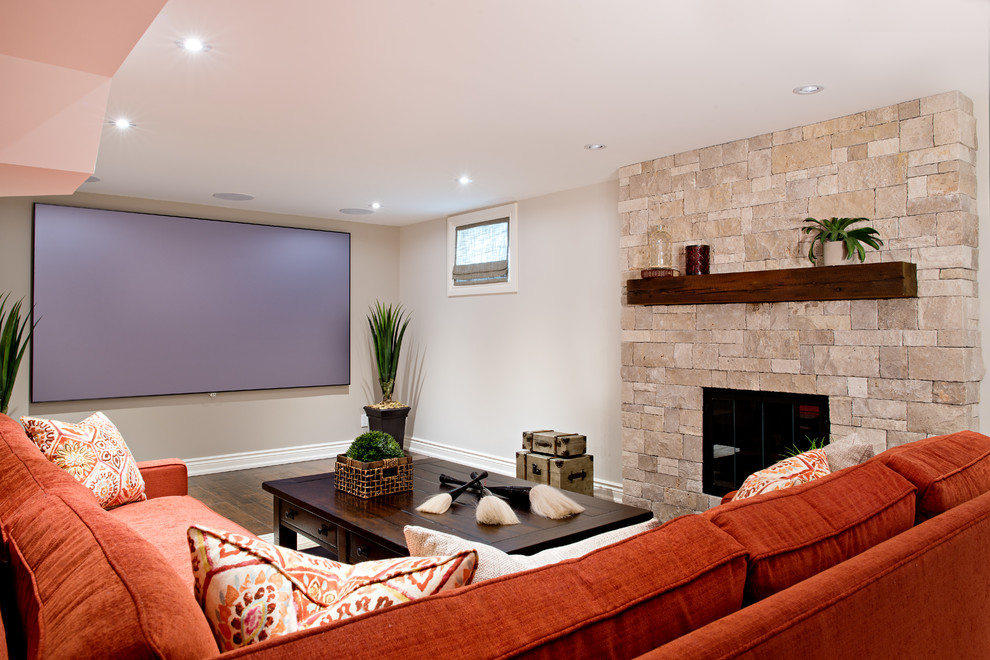 Photo of a large transitional look-out basement in Toronto with grey walls, porcelain floors, a standard fireplace and a stone fireplace surround.