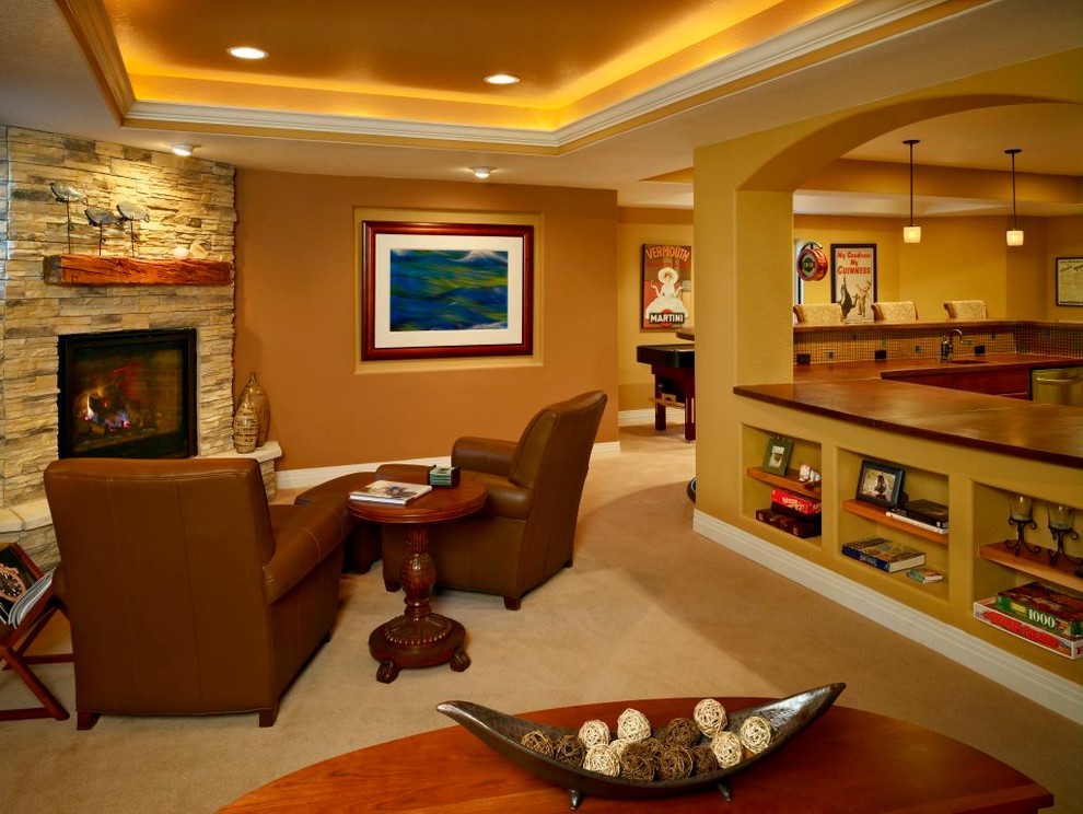 Photo of a traditional basement in Denver with a corner fireplace.