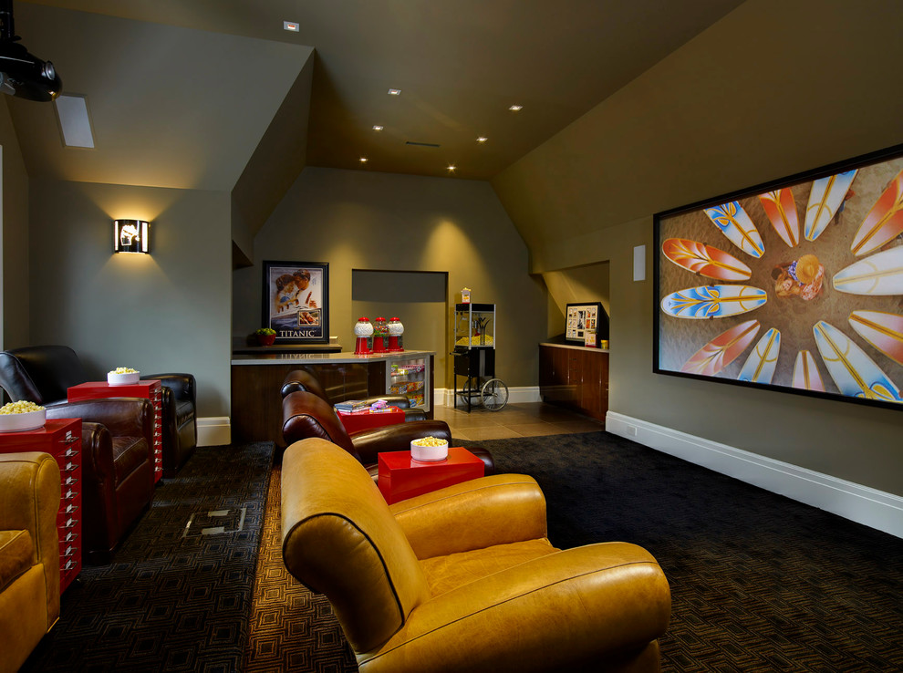 This is an example of a traditional enclosed home theatre in Detroit with a projector screen.