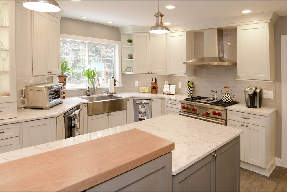 Example of a transitional kitchen design in New York