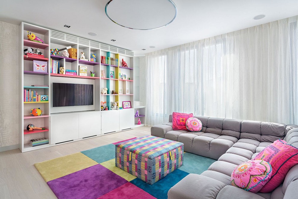 Design ideas for a contemporary kids' playroom for girls and kids 4-10 years old in Moscow with white walls, light hardwood floors and beige floor.