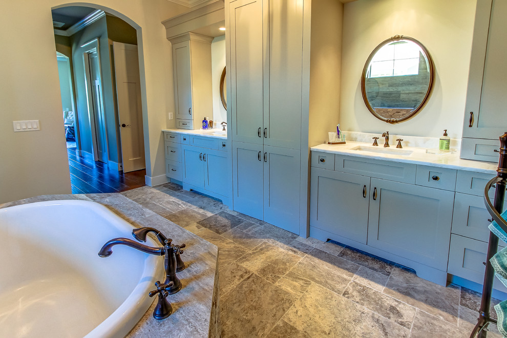 Large transitional master ceramic tile drop-in bathtub photo in Orange County with shaker cabinets, green cabinets, green walls, an undermount sink and marble countertops