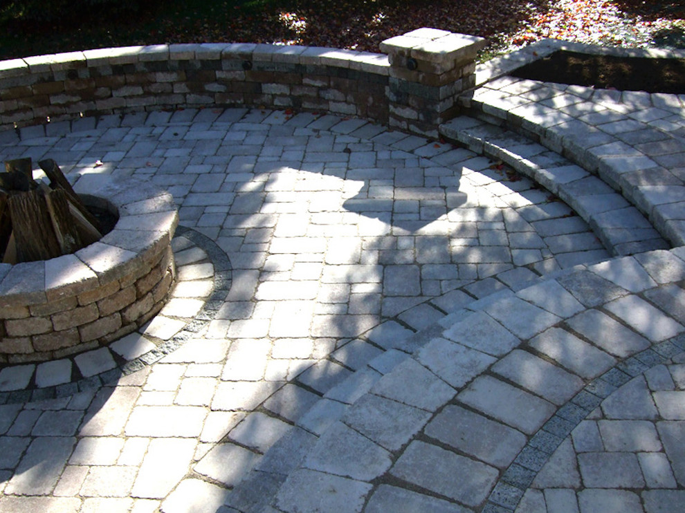 Design ideas for a large traditional backyard partial sun garden in Columbus with a fire feature and brick pavers.