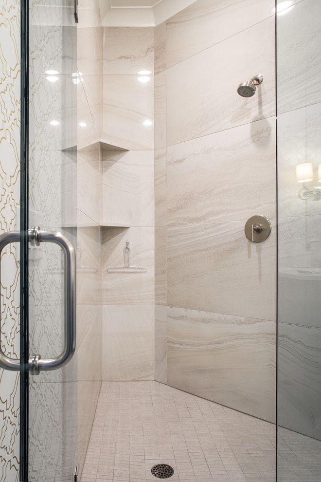 Inspiration for a mid-sized transitional 3/4 beige tile and porcelain tile porcelain tile and beige floor corner shower remodel in Omaha with flat-panel cabinets, brown cabinets, a two-piece toilet, multicolored walls, an undermount sink and a hinged shower door