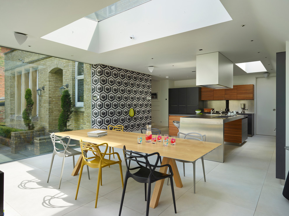 Photo of a contemporary kitchen/dining combo in London.