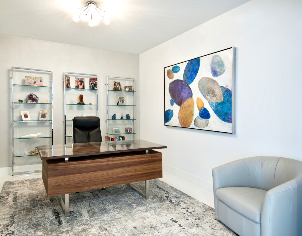This is an example of a small contemporary study room in Miami with grey walls, porcelain floors, a freestanding desk, white floor and wallpaper.
