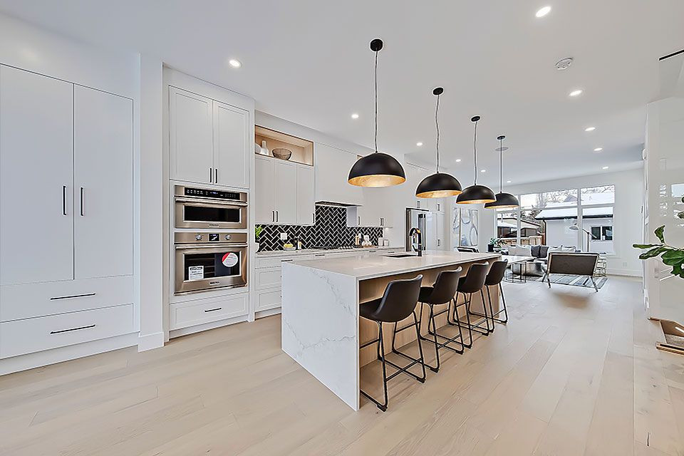 Transitional home design photo in Calgary